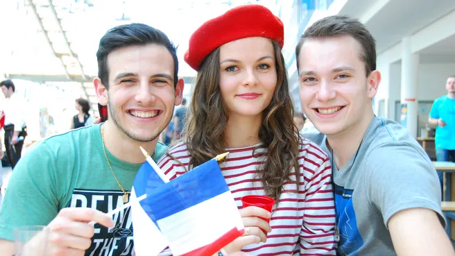 Three participants at the International Day of Mathematics, Computer Science and Physics 2014.