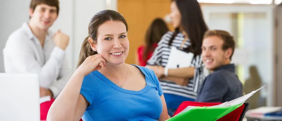 Female student with students in the background