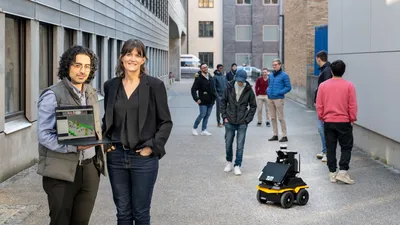 Researcher Sepehr Samavi and Prof. Angela Schoellig next to robot Jack